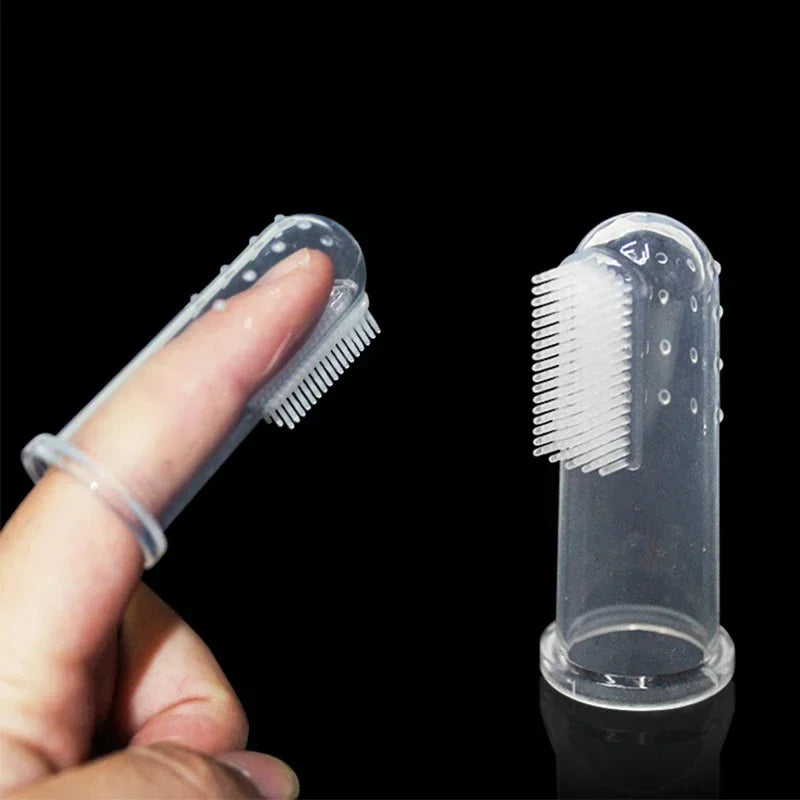 El cepillo de dientes de dedo suave de piel para perros y gatos