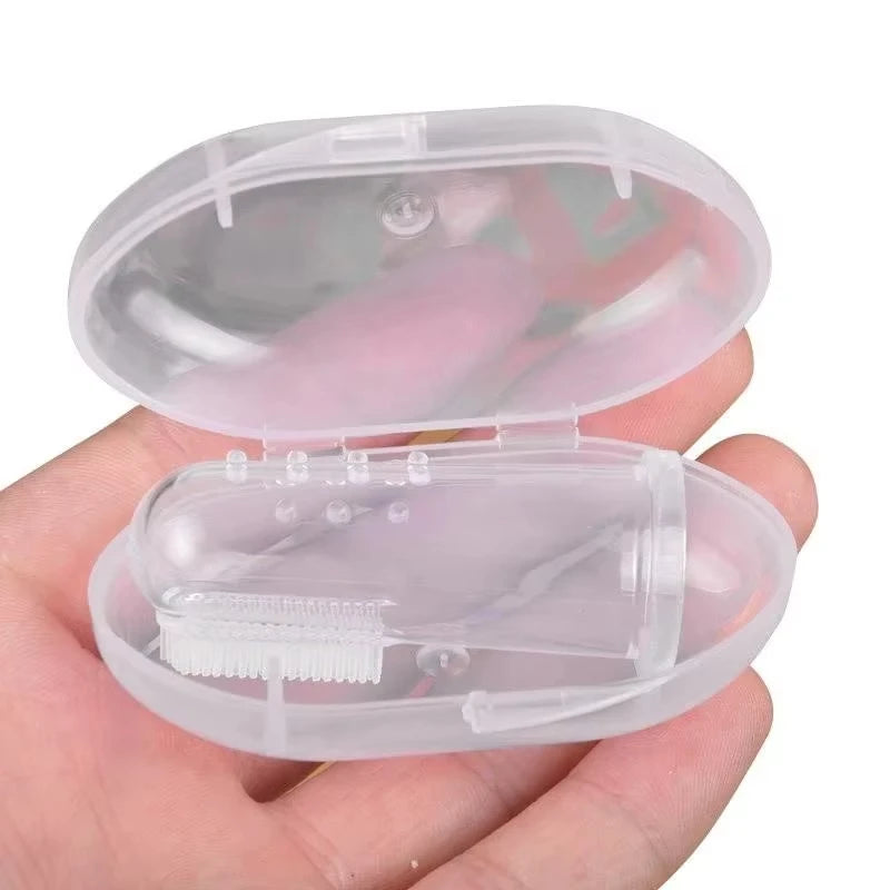 El cepillo de dientes de dedo suave de piel para perros y gatos