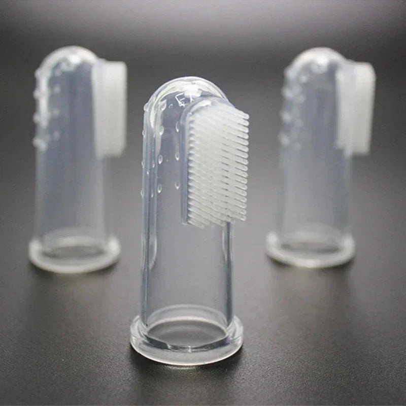 El cepillo de dientes de dedo suave de piel para perros y gatos