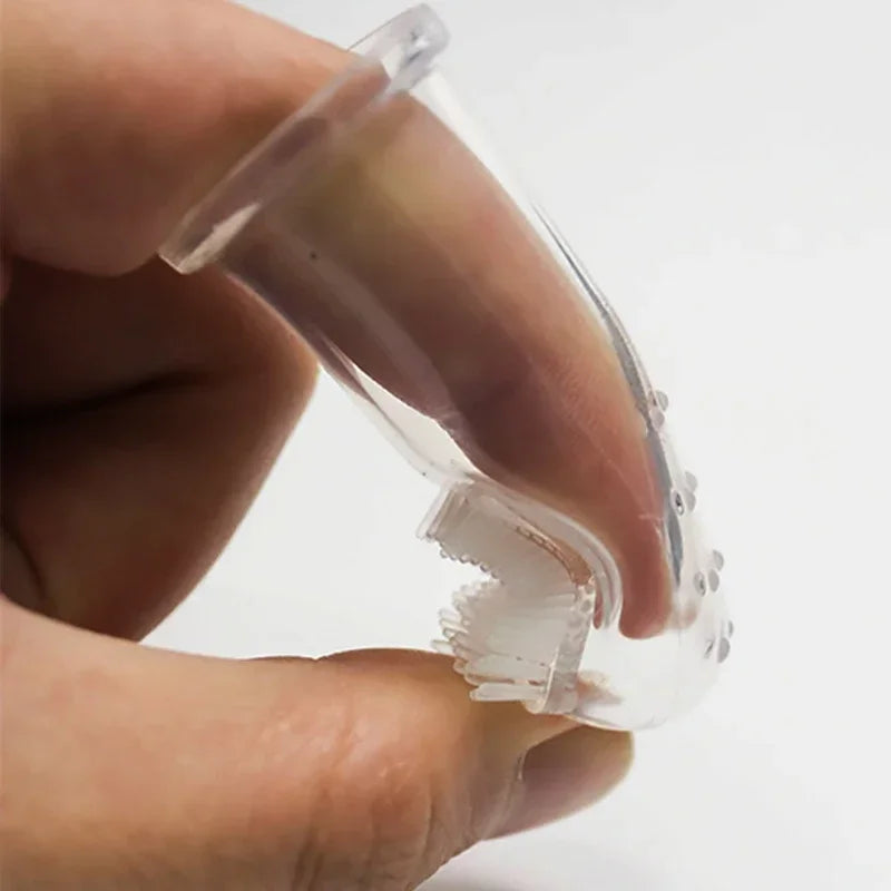 El cepillo de dientes de dedo suave de piel para perros y gatos